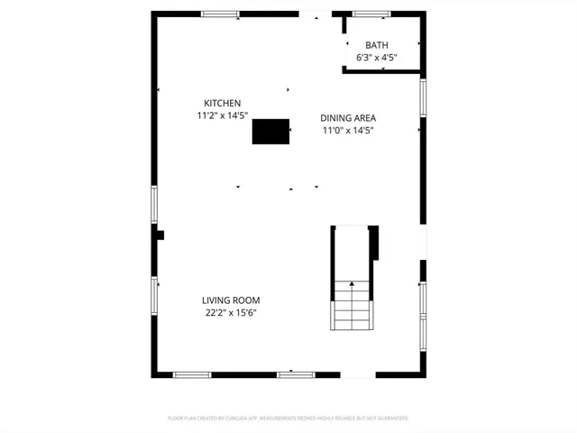 a view of a house with a big yard and large trees