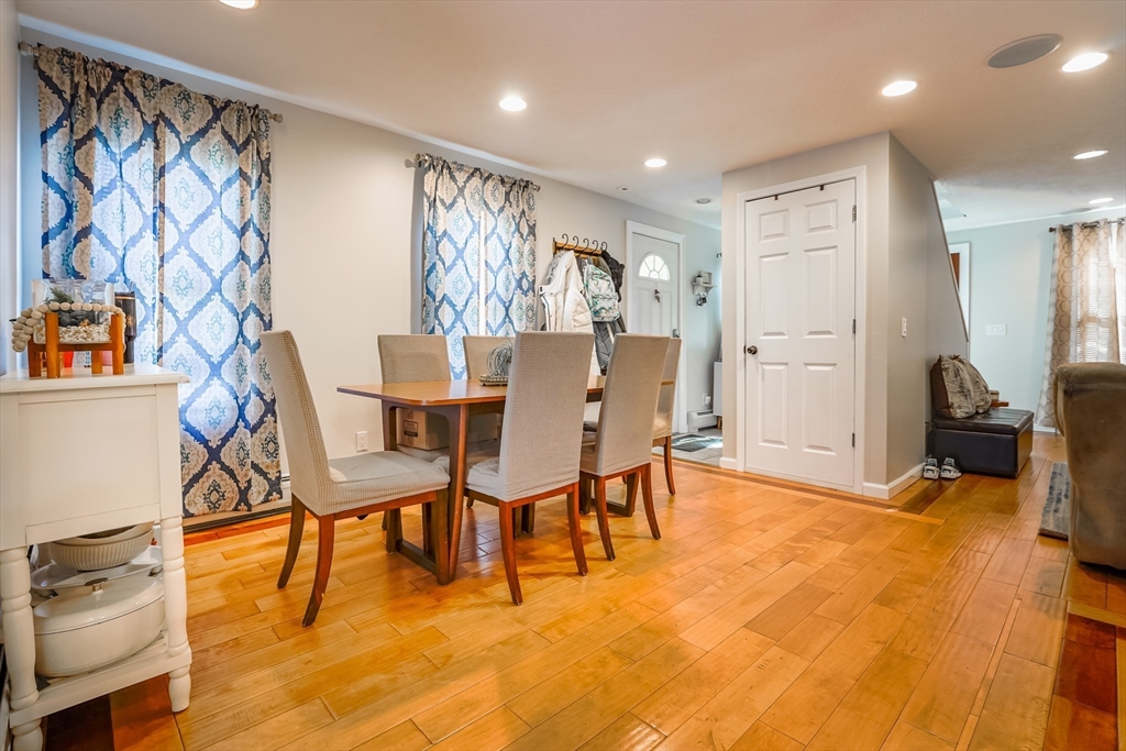 142 Norman Street Fall River, MA 02721 - Photo 6 of 25 a view of a dining room with furniture and a chandelier