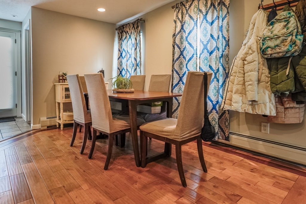 142 Norman Street Fall River, MA 02721 - Photo 7 of 25 a view of a dining room with furniture and wooden floor