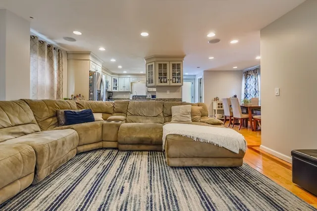 a living room with furniture and a couch