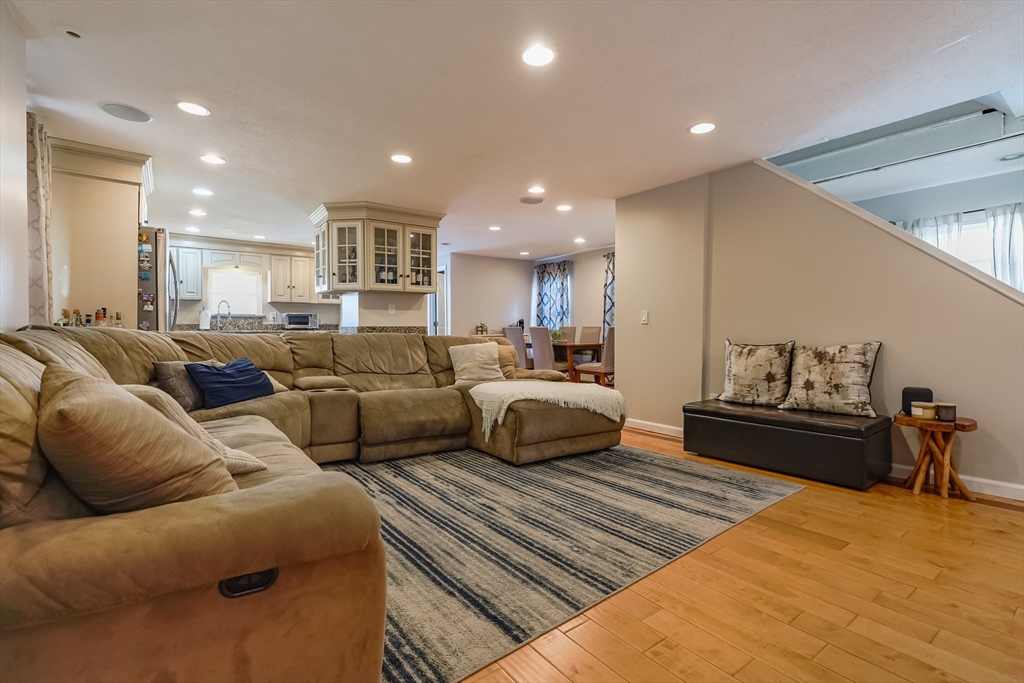 142 Norman Street Fall River, MA 02721 - Photo 9 of 25 a living room with furniture and a couch