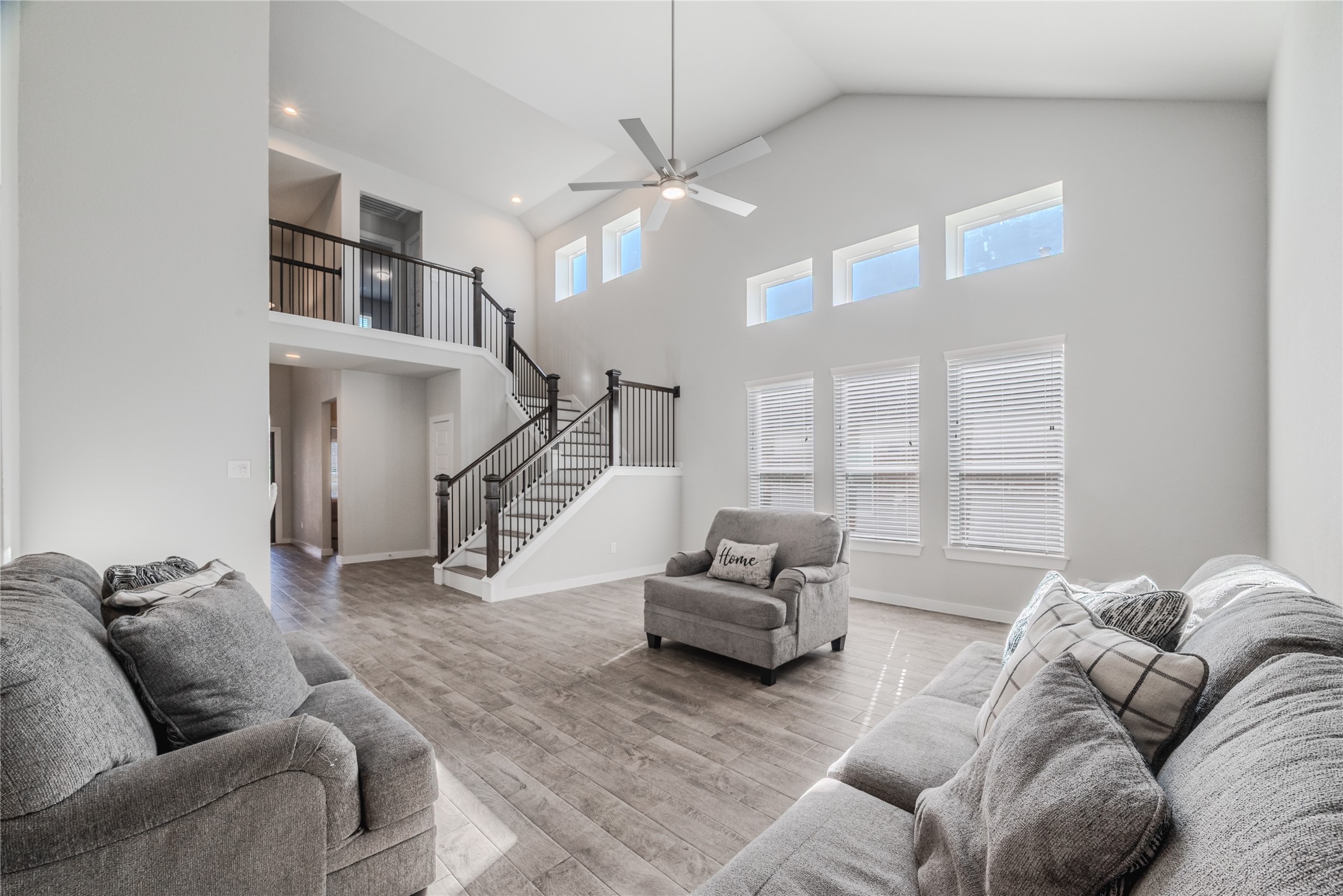 4259 Wyanngate Drive Spring, TX 77373 - Photo 10 of 46 Expansive windows invite abundant natural light to fill the soaring, airy living space
