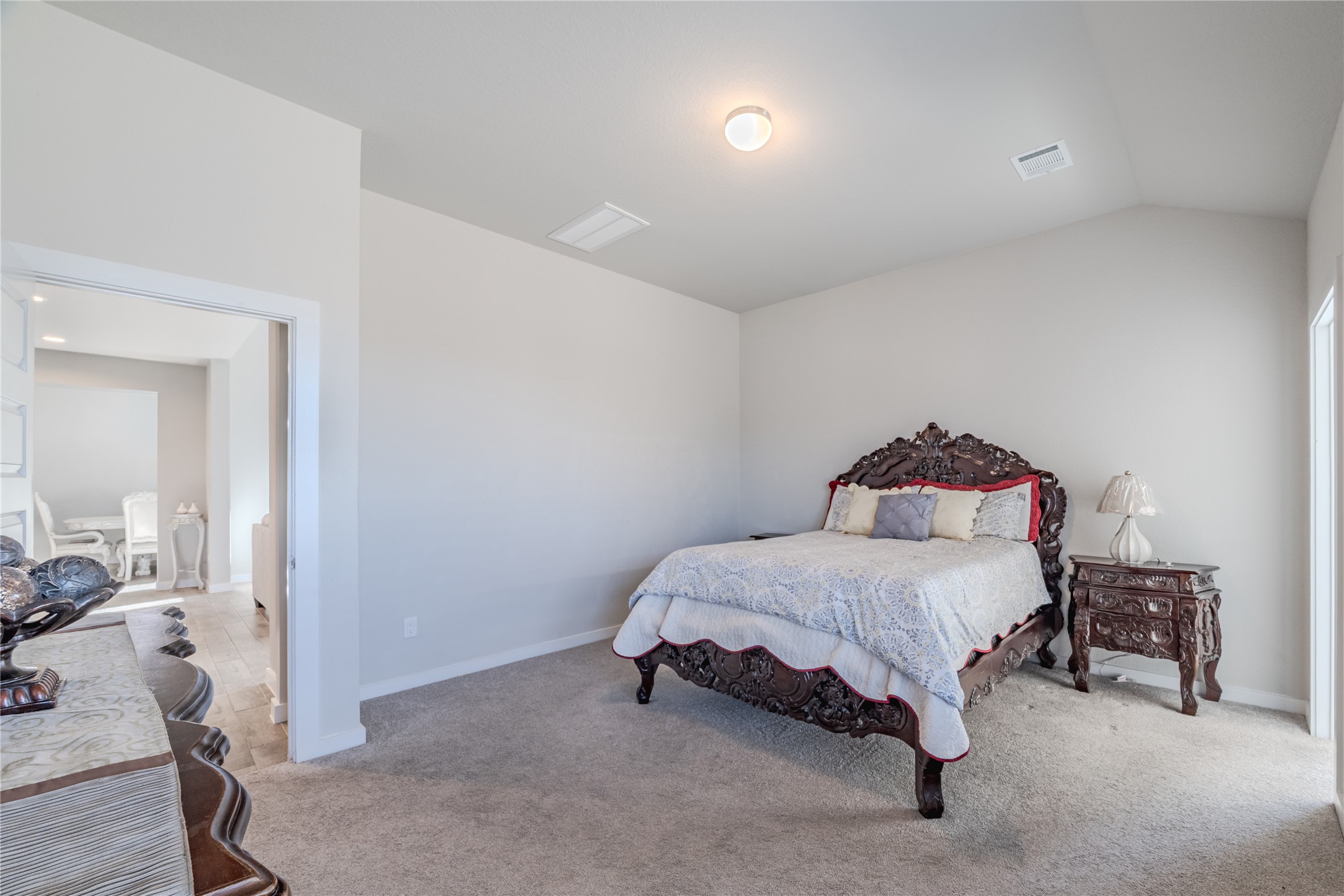 4259 Wyanngate Drive Spring, TX 77373 - Photo 26 of 46 Experience ultimate comfort in the primary bedroom, bathed in abundant natural light with plenty of space for a seating area