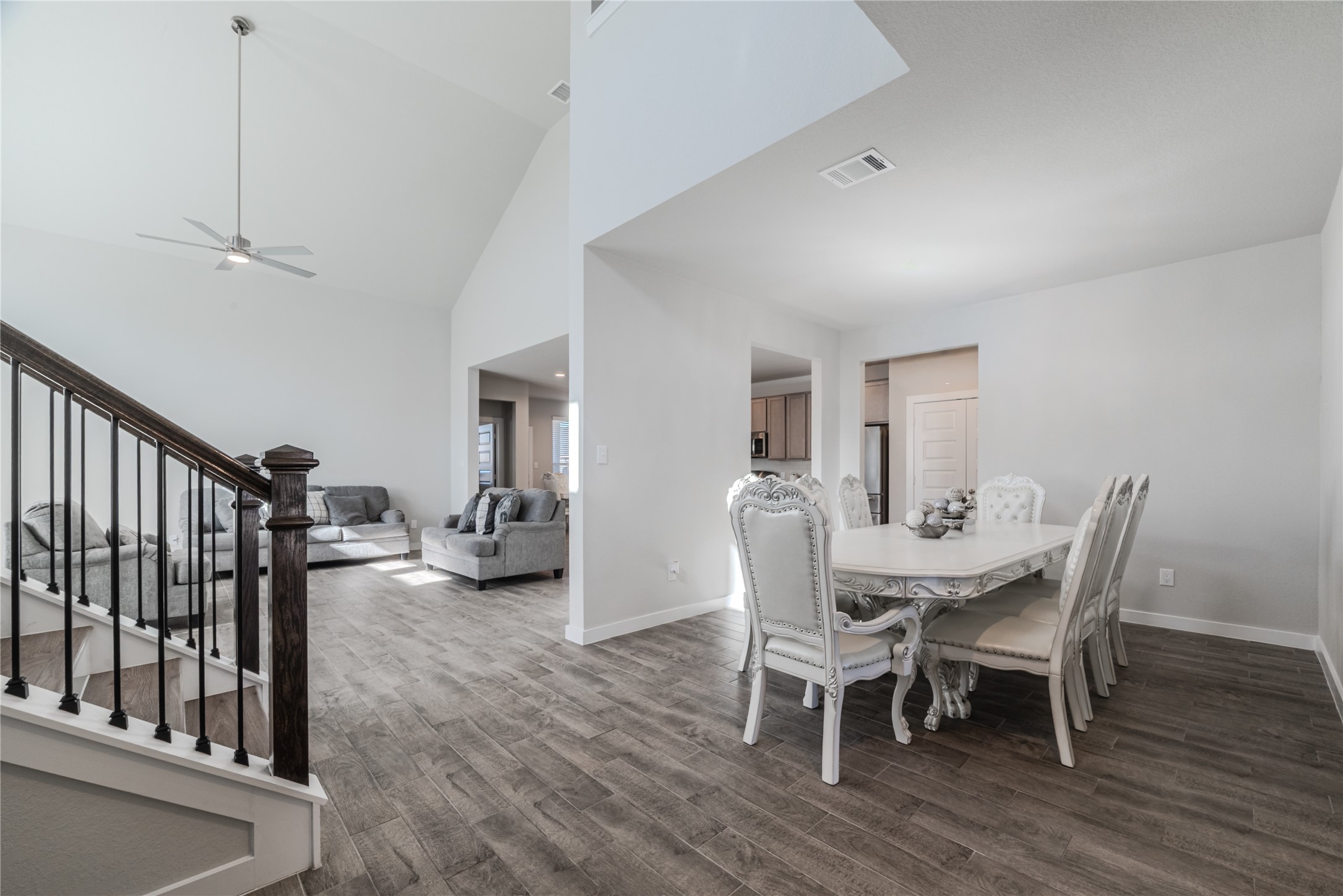 4259 Wyanngate Drive Spring, TX 77373 - Photo 45 of 46 The welcoming entry hallway opens into a bright and airy floor plan, showcasing the seamless transition between the dining and living areas
