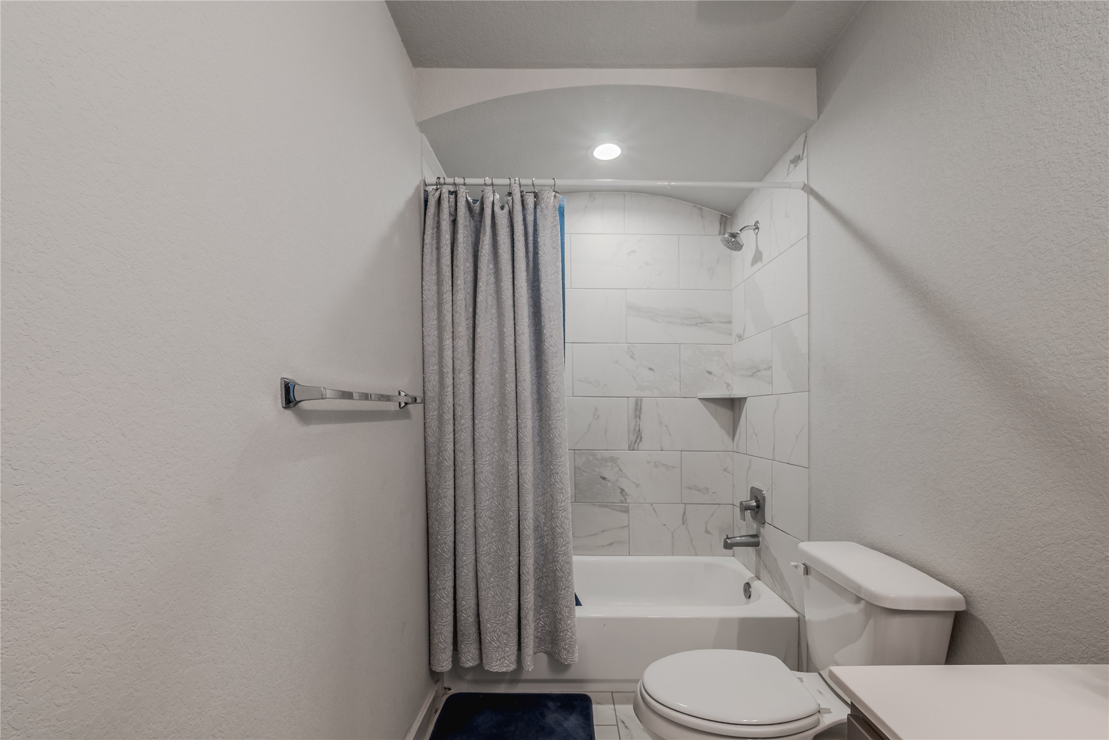 4259 Wyanngate Drive Spring, TX 77373 - Photo 35 of 46 Bright and modern full bath with stylish tile flooring and a neutral color palette that complements the rest of the home