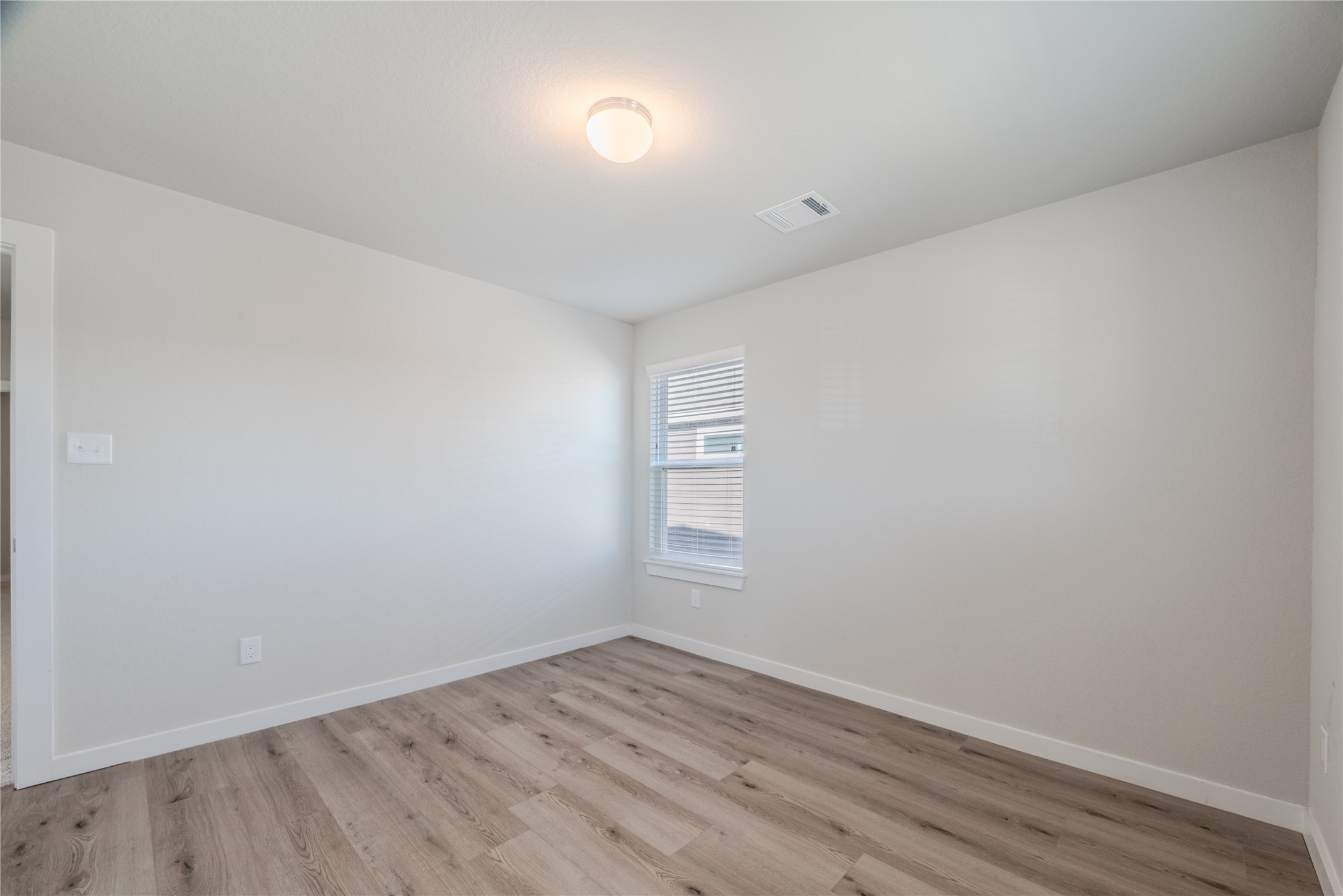 4259 Wyanngate Drive Spring, TX 77373 - Photo 37 of 46 This spacious fourth bedroom features large windows that provide plenty of natural light and a serene view of the neighborhood