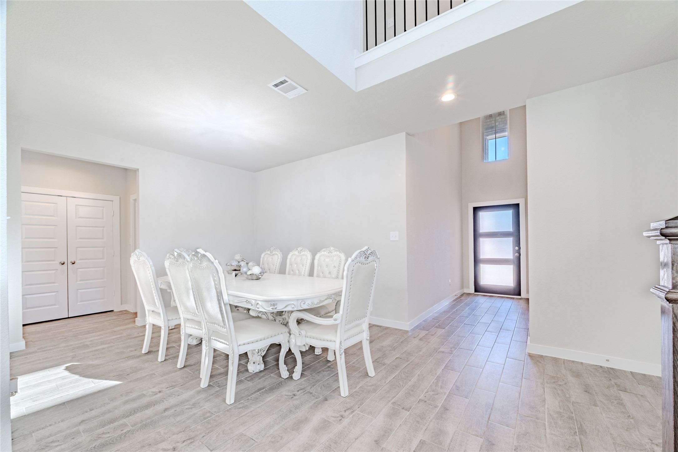 4259 Wyanngate Drive Spring, TX 77373 - Photo 5 of 46 This view highlights the convenient pantry access, the formal dining room, and the welcoming entry hallway.