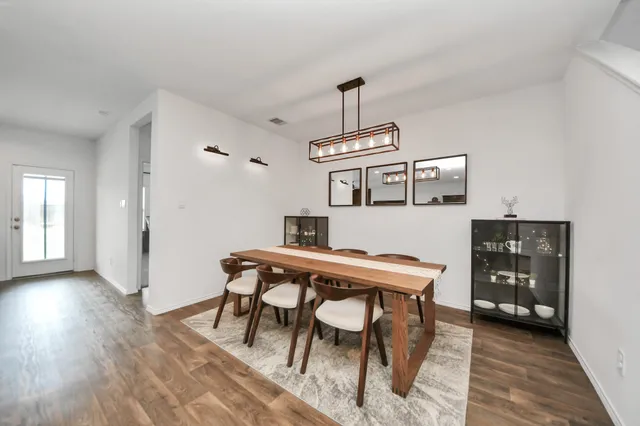 a view of a hallway with seating area