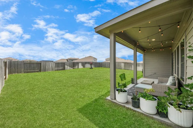 aerial view of a house with a swimming pool