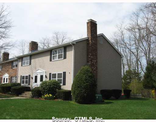24 Boulder Road, Unit 24 Colchester, CT 06415 - Photo 1 of 1 a front view of a house with a garden
