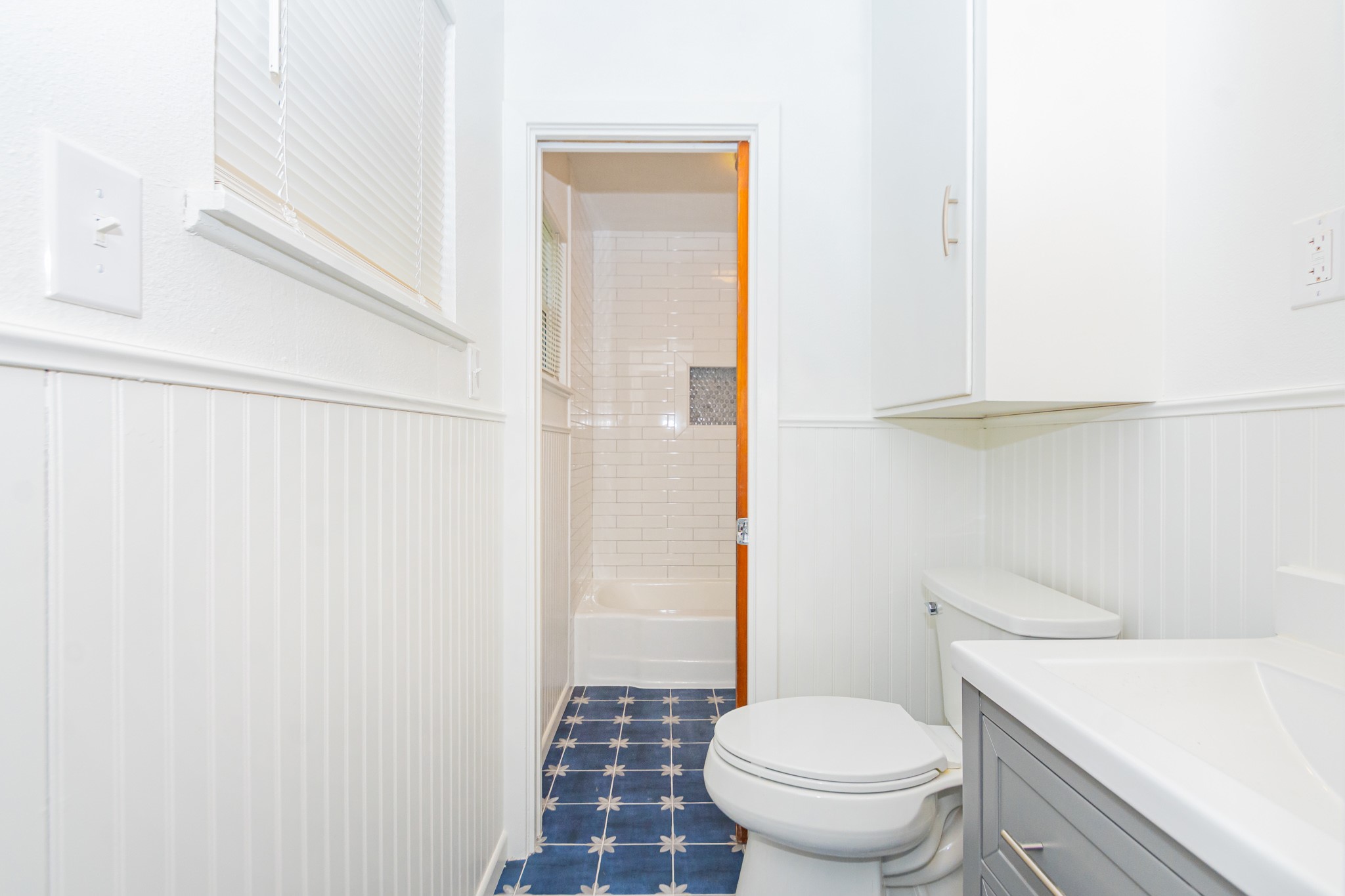 1007 Earley Street Sweeny, TX 77480 - Photo 18 of 33 a white toilet sitting next to a bathroom sink