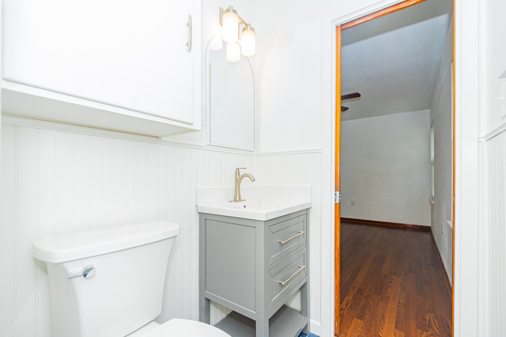 1007 Earley Street Sweeny, TX 77480 - Photo 19 of 33 a bathroom with a sink a toilet and shower