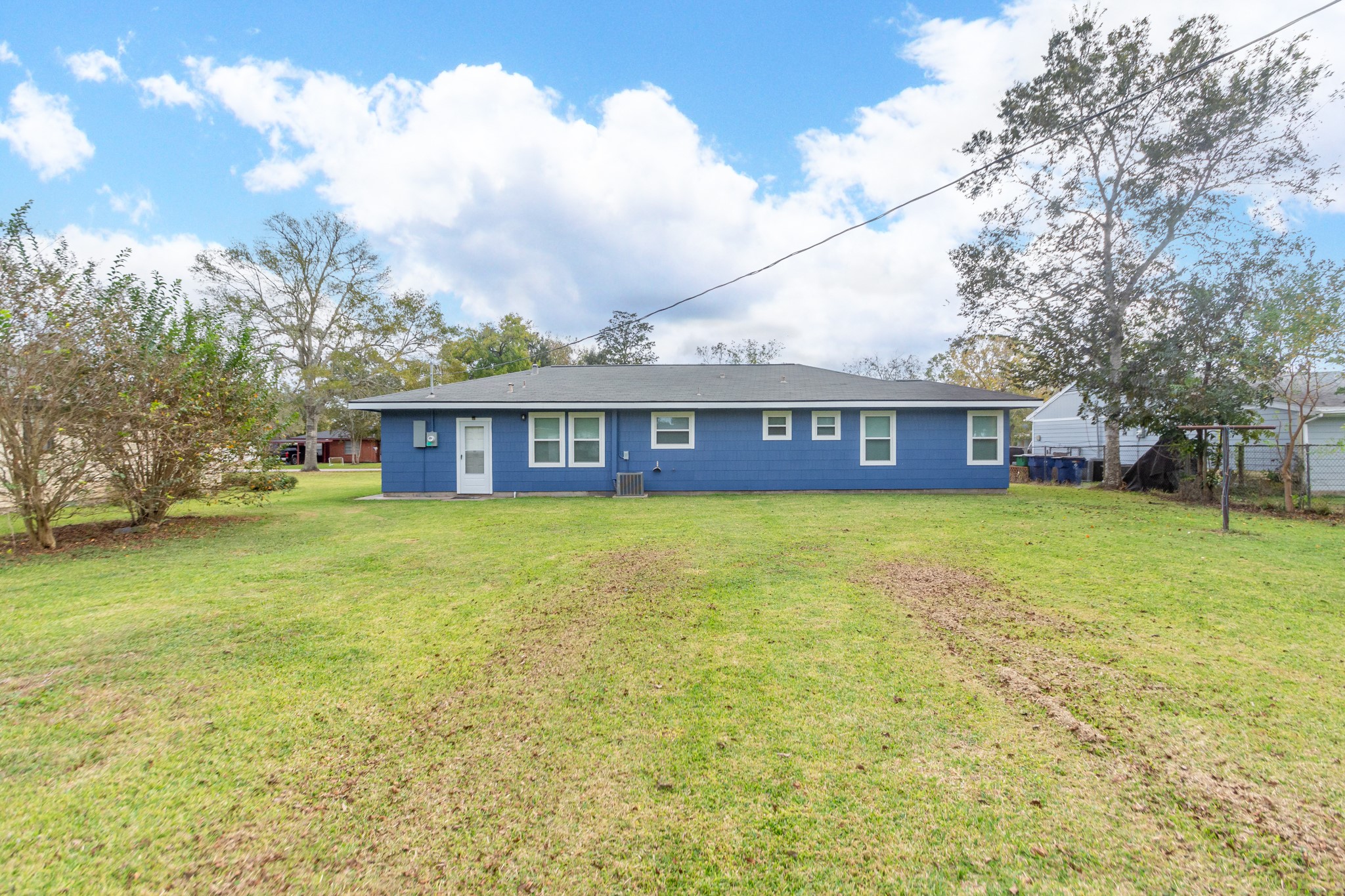 1007 Earley Street Sweeny, TX 77480 - Photo 28 of 33 a front view of house with yard and entertaining space
