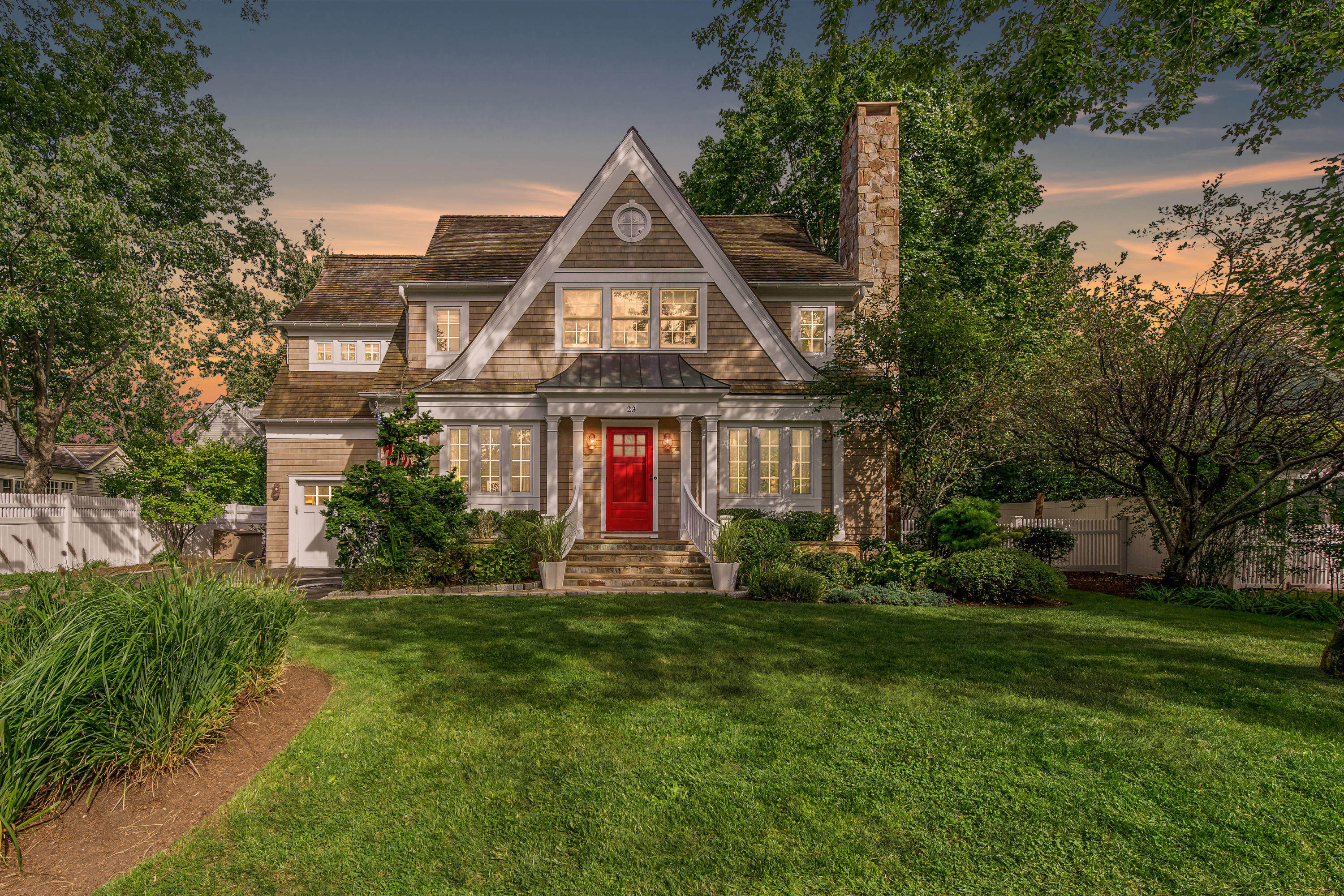 23 Waverly Road Darien, CT 06820 - Photo 1 of 28 a view of a house with a big yard and potted plants
