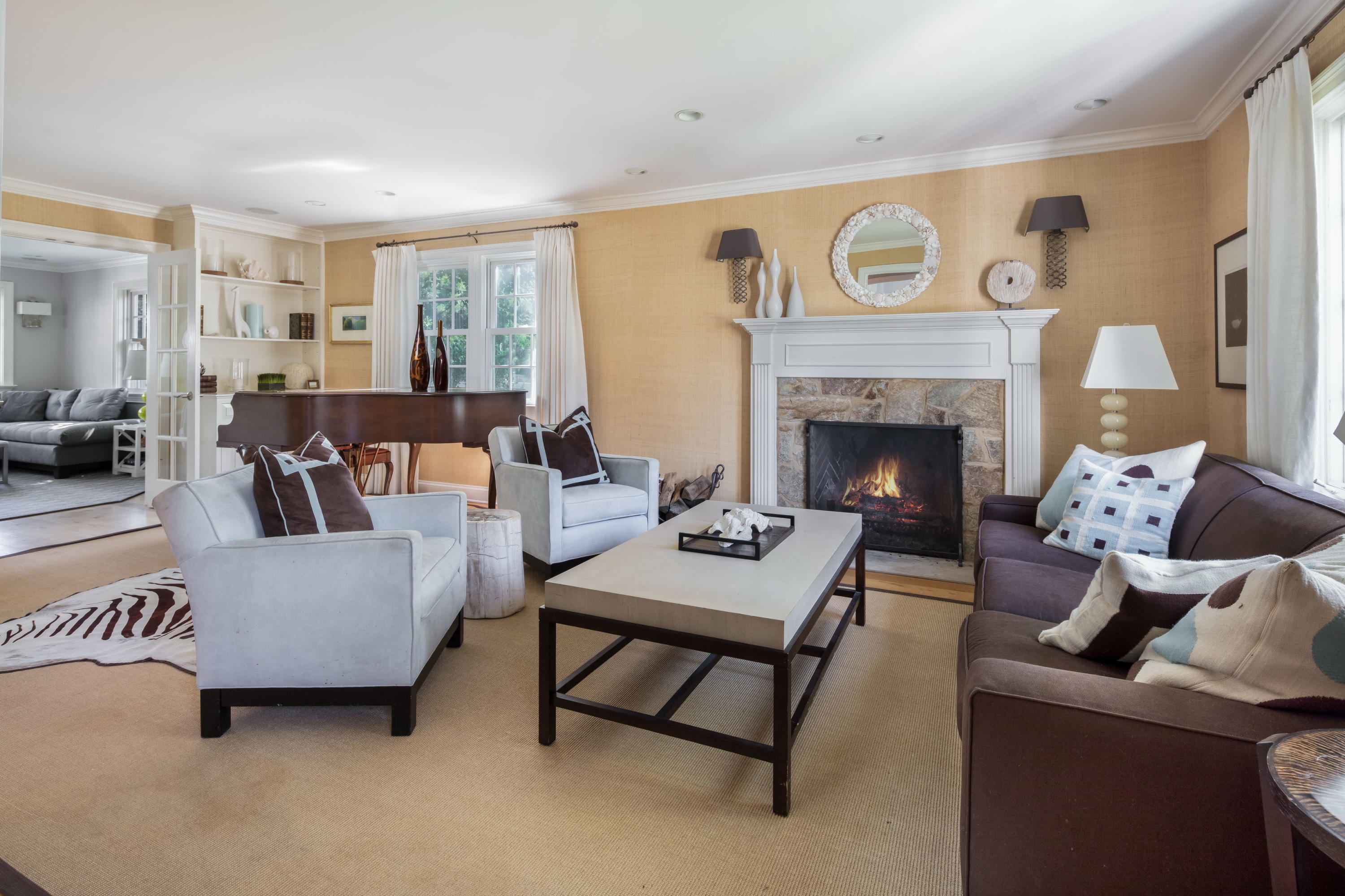 23 Waverly Road Darien, CT 06820 - Photo 8 of 28 a living room with furniture and a fireplace