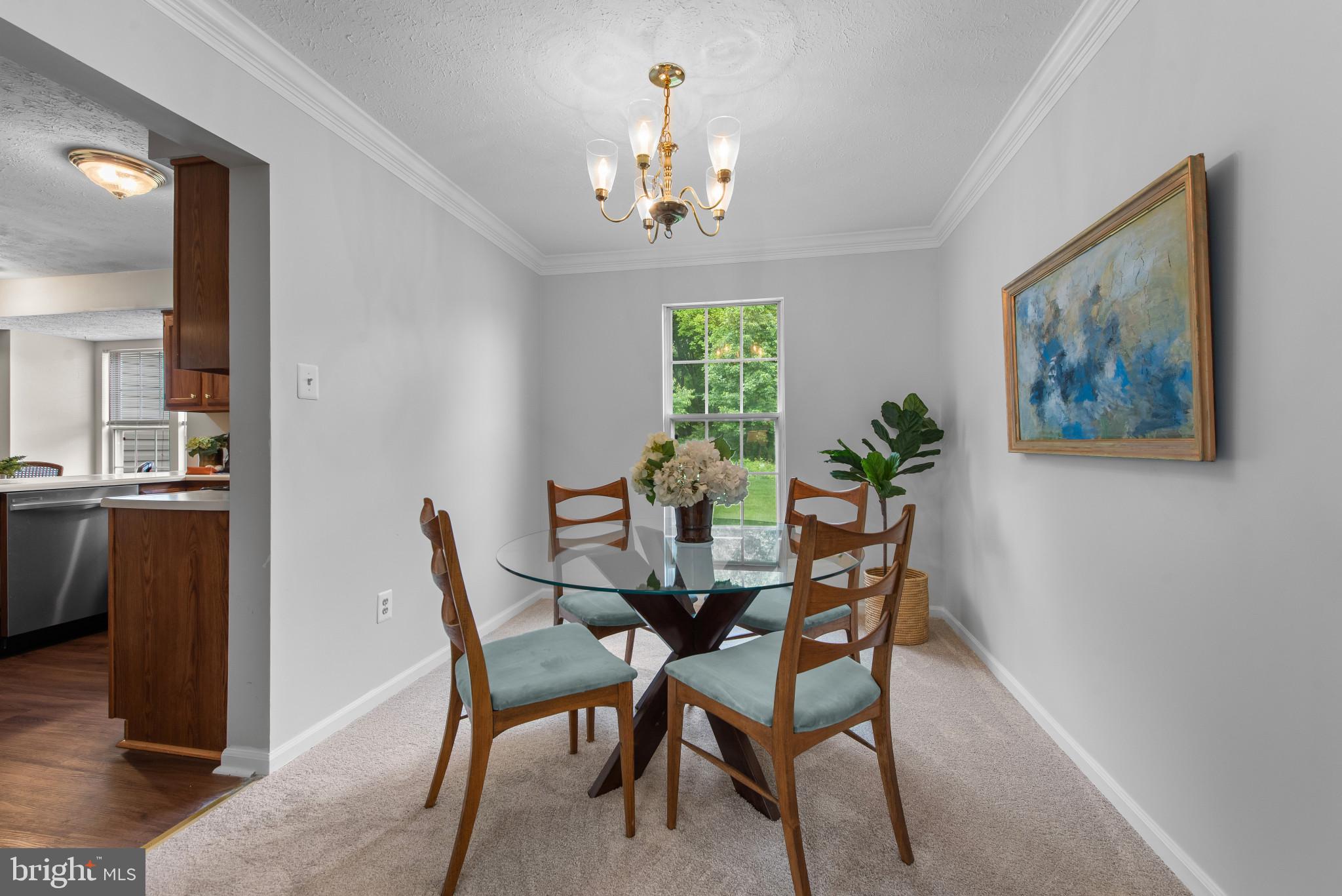 3107 Pouska Road Abingdon, MD 21009 - Photo 8 of 38 a view of a dining room with furniture and chandelier