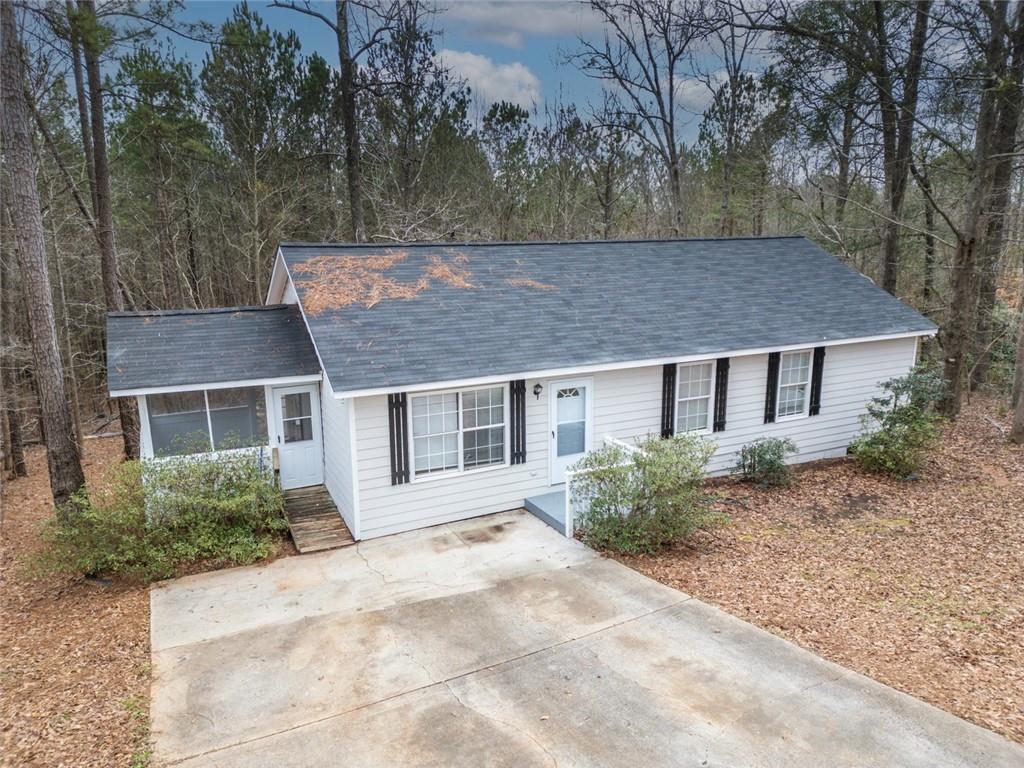 697 Rocky Point Road Covington, GA 30014 - Photo 1 of 1 front view of house with a yard