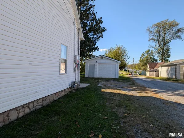 a house view with a garden space