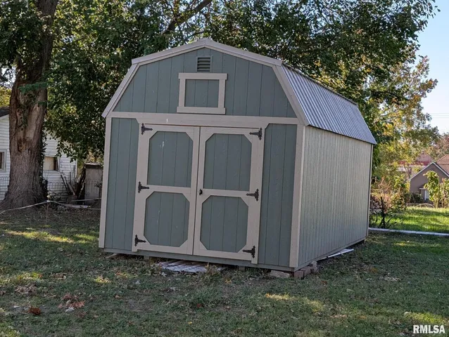 a view of backyard of house