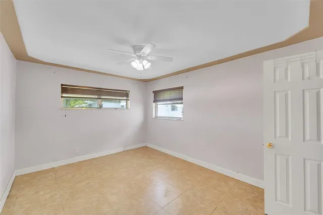 an empty room with windows