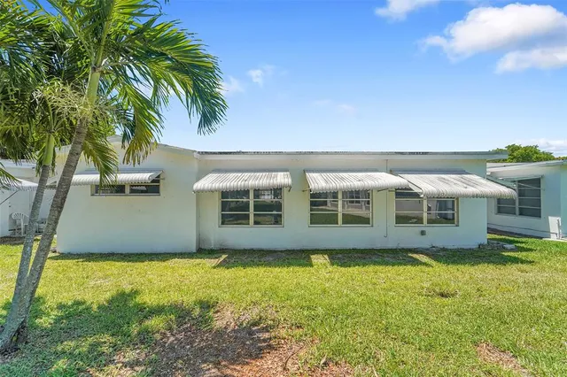 a front view of house with yard