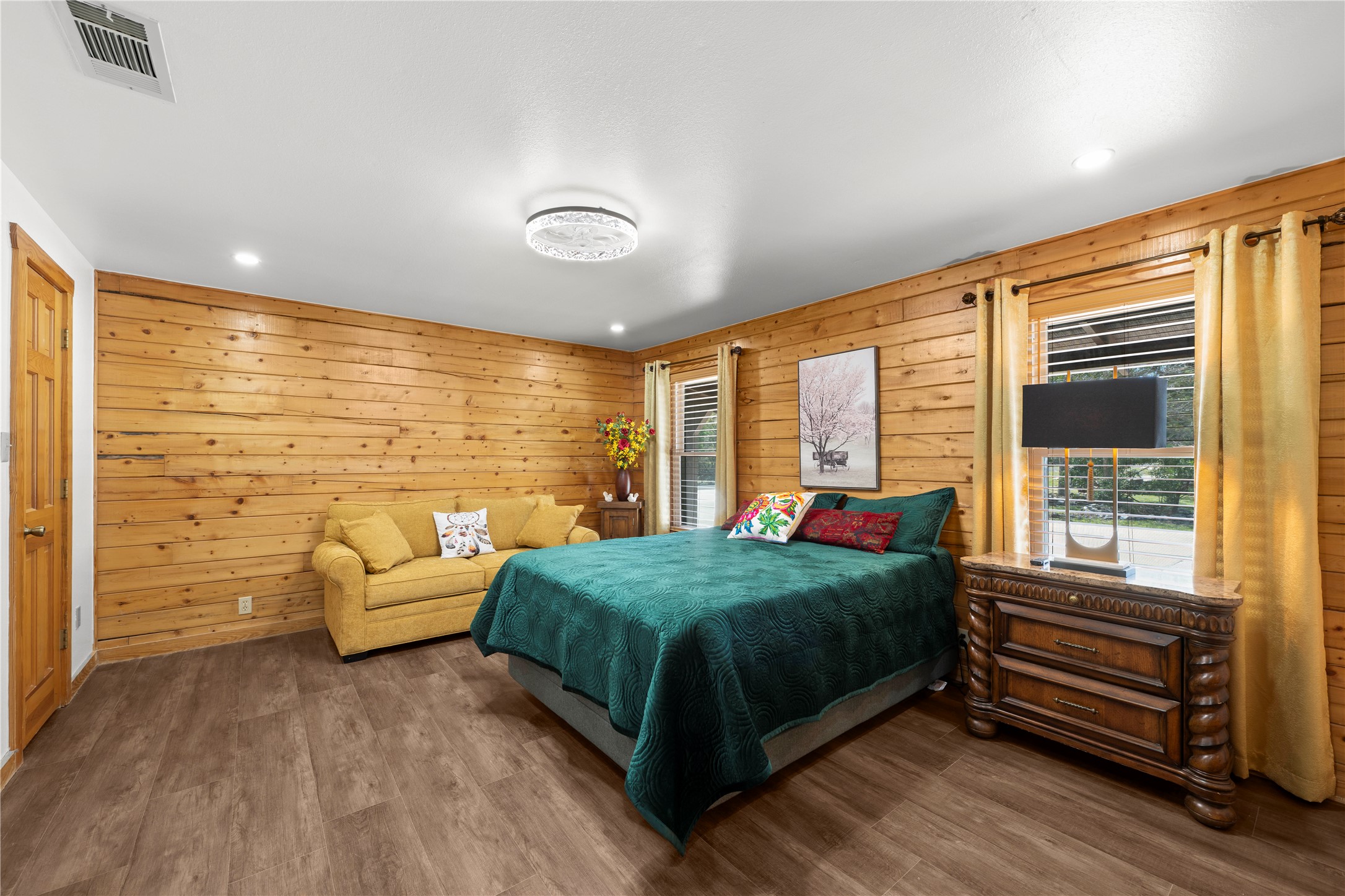 5597 Cliff Lane Temple, TX 76502 - Photo 22 of 38 a bedroom with a bed and a large window