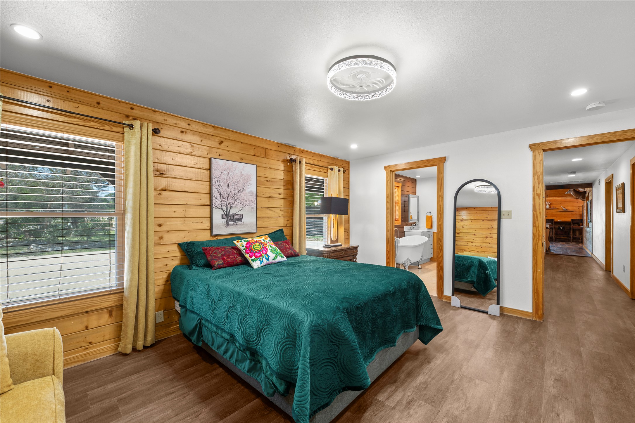 5597 Cliff Lane Temple, TX 76502 - Photo 23 of 38 a bedroom with a large bed and a large window
