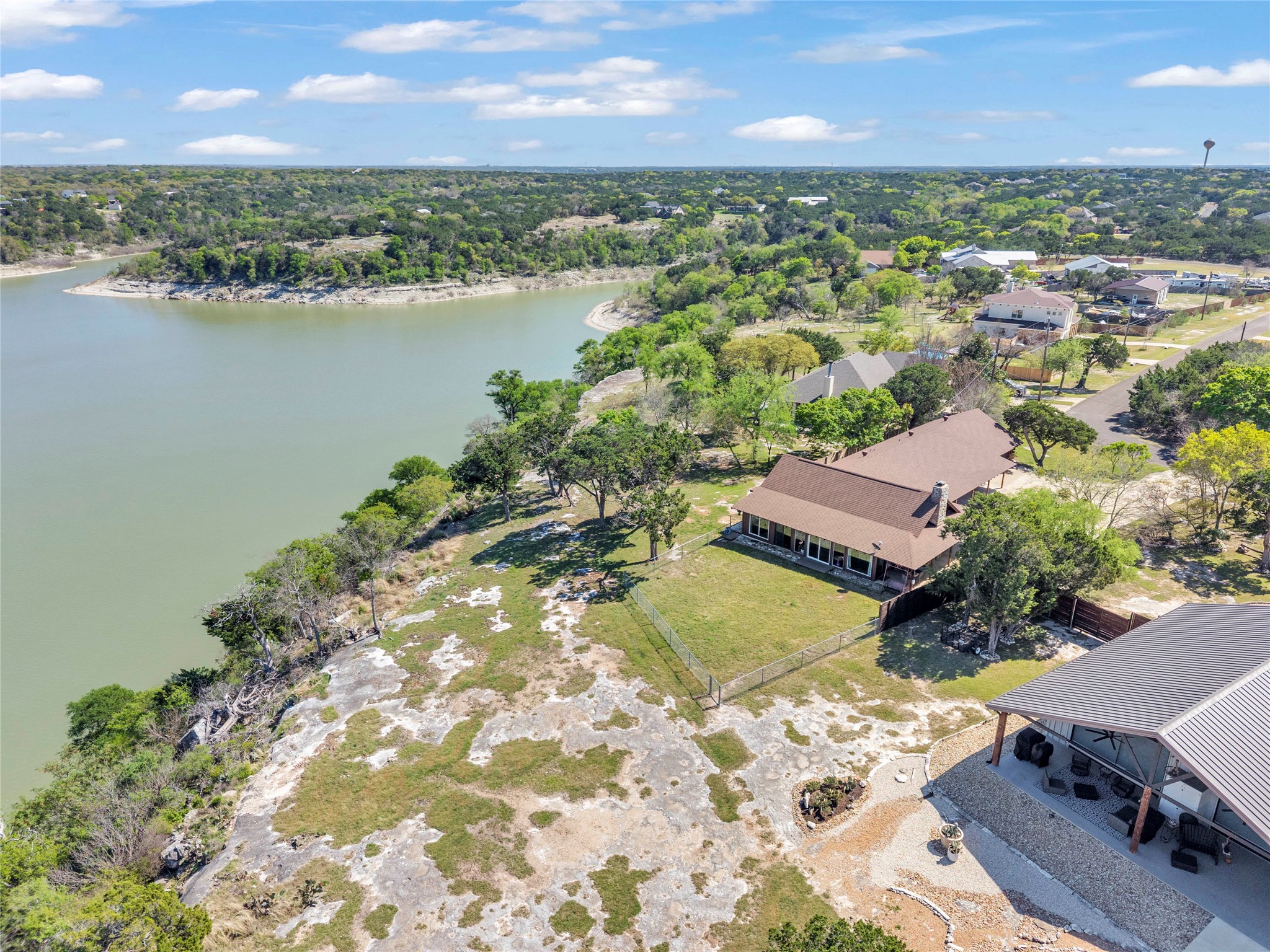 5597 Cliff Lane Temple, TX 76502 - Photo 34 of 38 an aerial view of a houses with a lake view