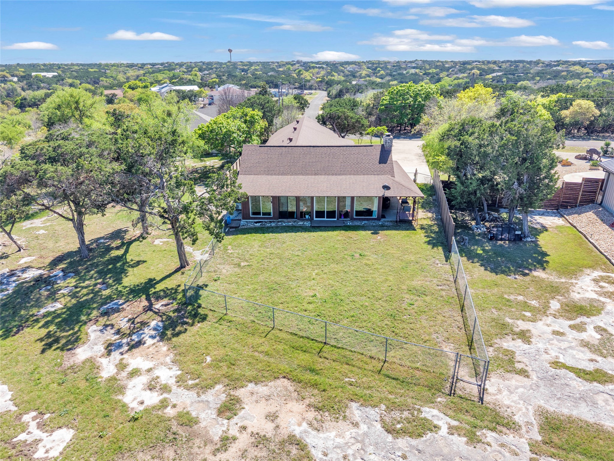 5597 Cliff Lane Temple, TX 76502 - Photo 36 of 38 a view of a swimming pool with a patio