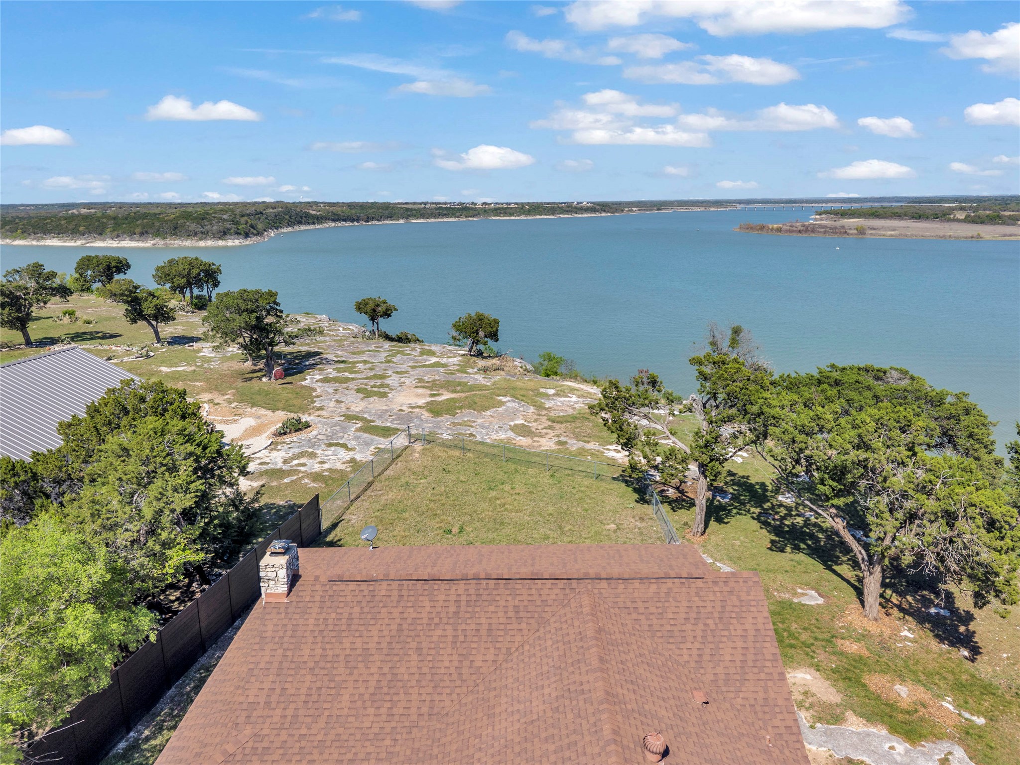 5597 Cliff Lane Temple, TX 76502 - Photo 37 of 38 a view of a lake with a yard
