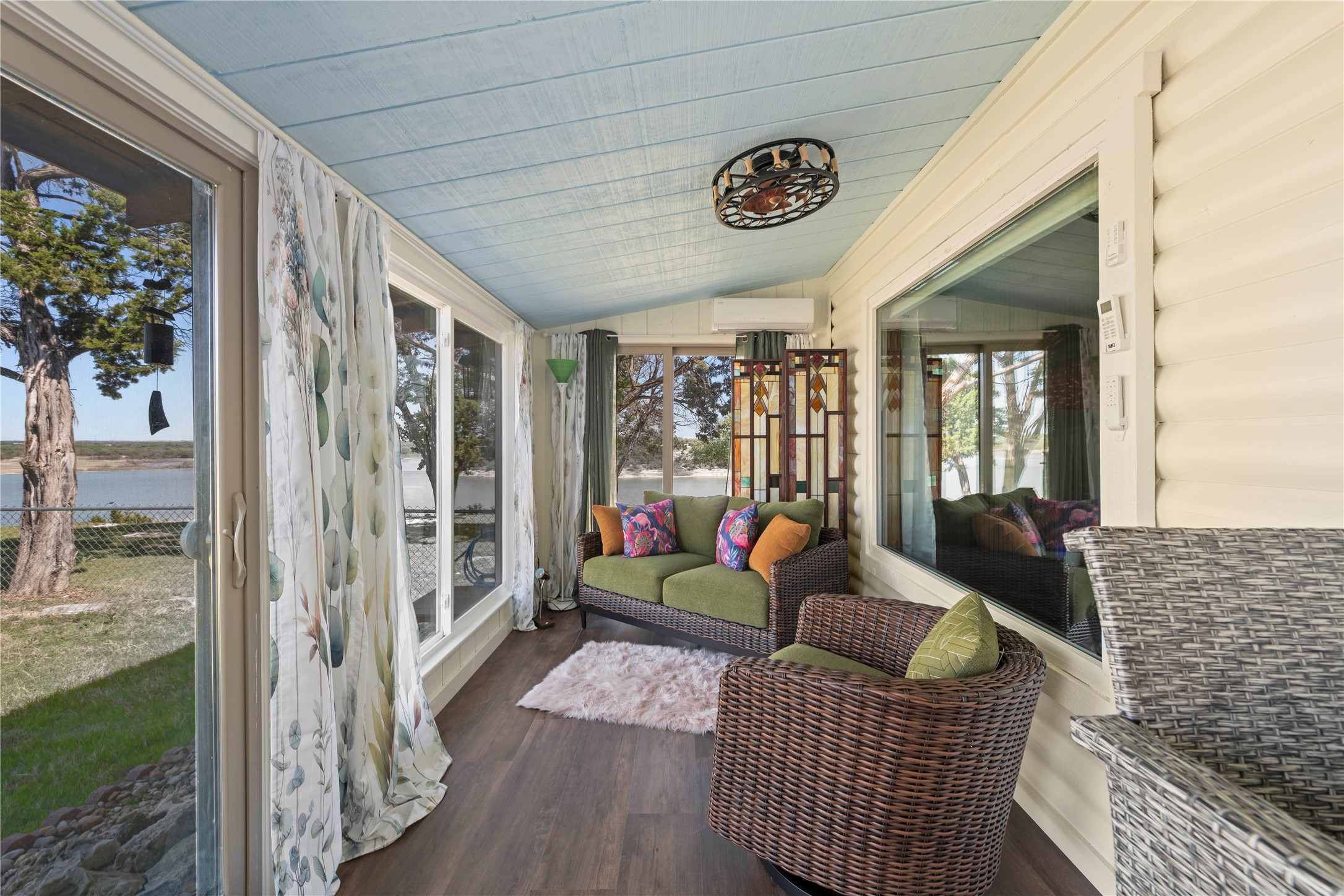 5597 Cliff Lane Temple, TX 76502 - Photo 9 of 38 a balcony view with a couch and wooden floor