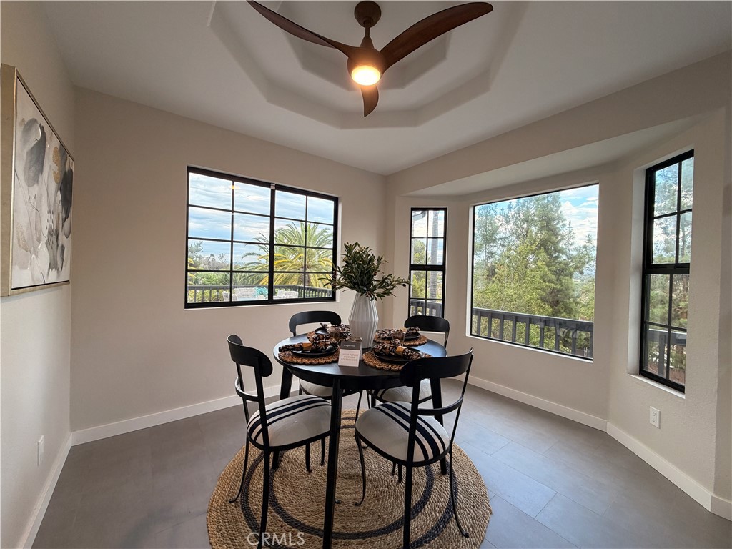 1677 South Hill Avenue Fallbrook, CA 92028 - Photo 26 of 74 a view of a dining room with furniture window and outside view