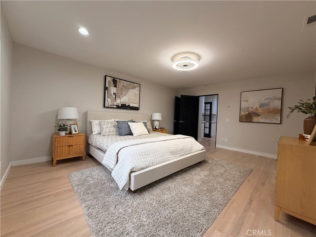 1677 South Hill Avenue Fallbrook, CA 92028 - Photo 45 of 74 a bedroom with a bed and a couch