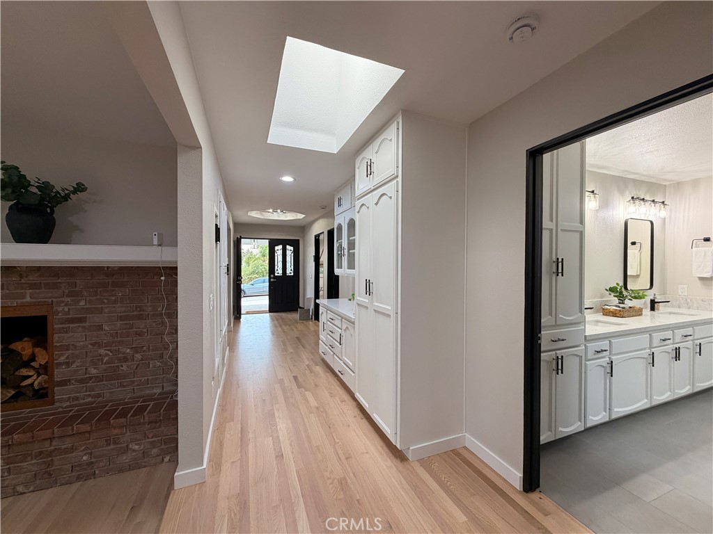 1677 South Hill Avenue Fallbrook, CA 92028 - Photo 53 of 74 View towards front door with family room to left, main bathroom to the right