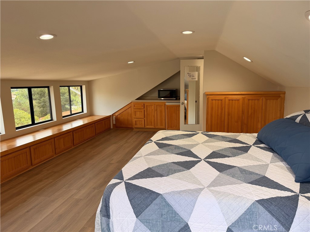 1677 South Hill Avenue Fallbrook, CA 92028 - Photo 63 of 74 a view of a livingroom with wooden floor and staircase