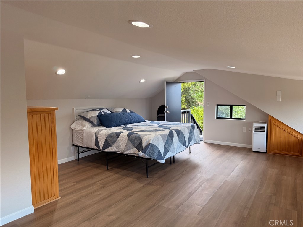 1677 South Hill Avenue Fallbrook, CA 92028 - Photo 64 of 74 a spacious bedroom with a bed and a dresser