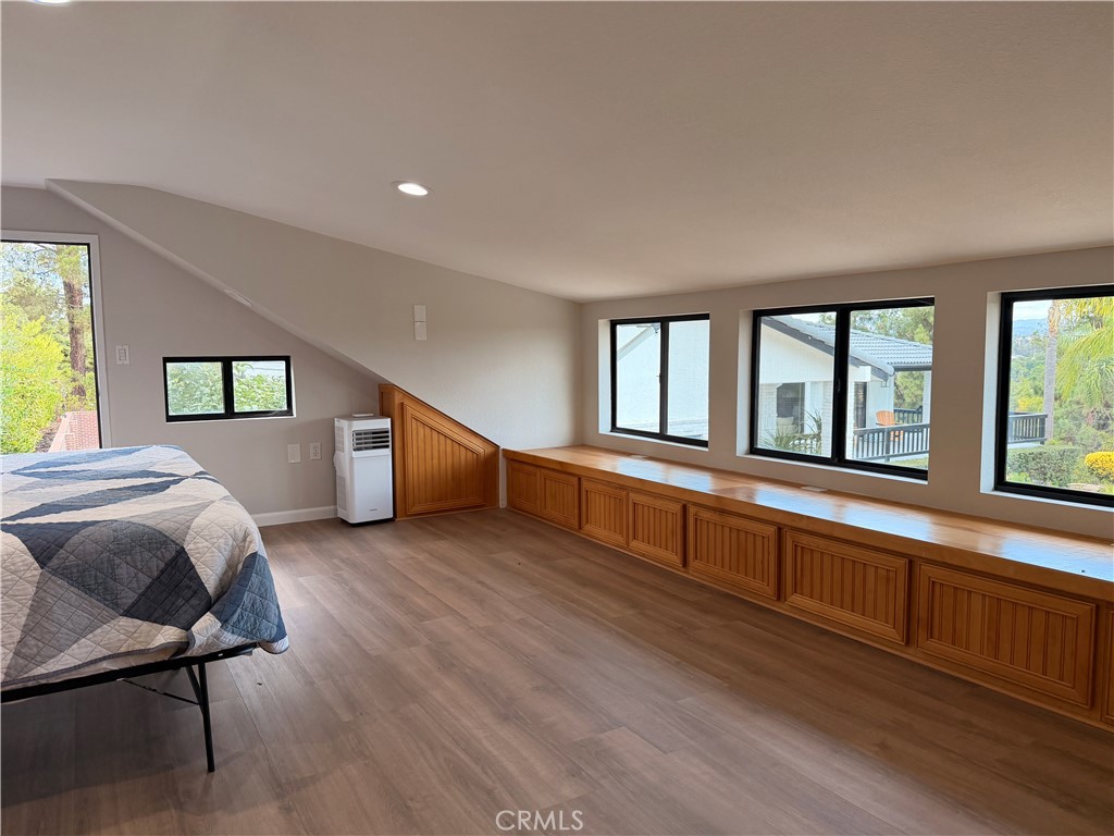 1677 South Hill Avenue Fallbrook, CA 92028 - Photo 68 of 74 a spacious bedroom with a large bed and a large window