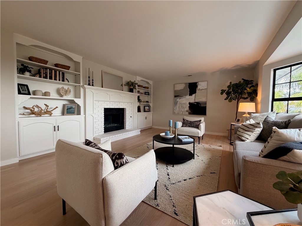 1677 South Hill Avenue Fallbrook, CA 92028 - Photo 8 of 74 a living room with furniture a rug and a flat screen tv