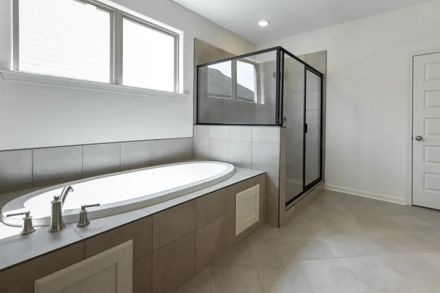 a kitchen with a sink and a refrigerator