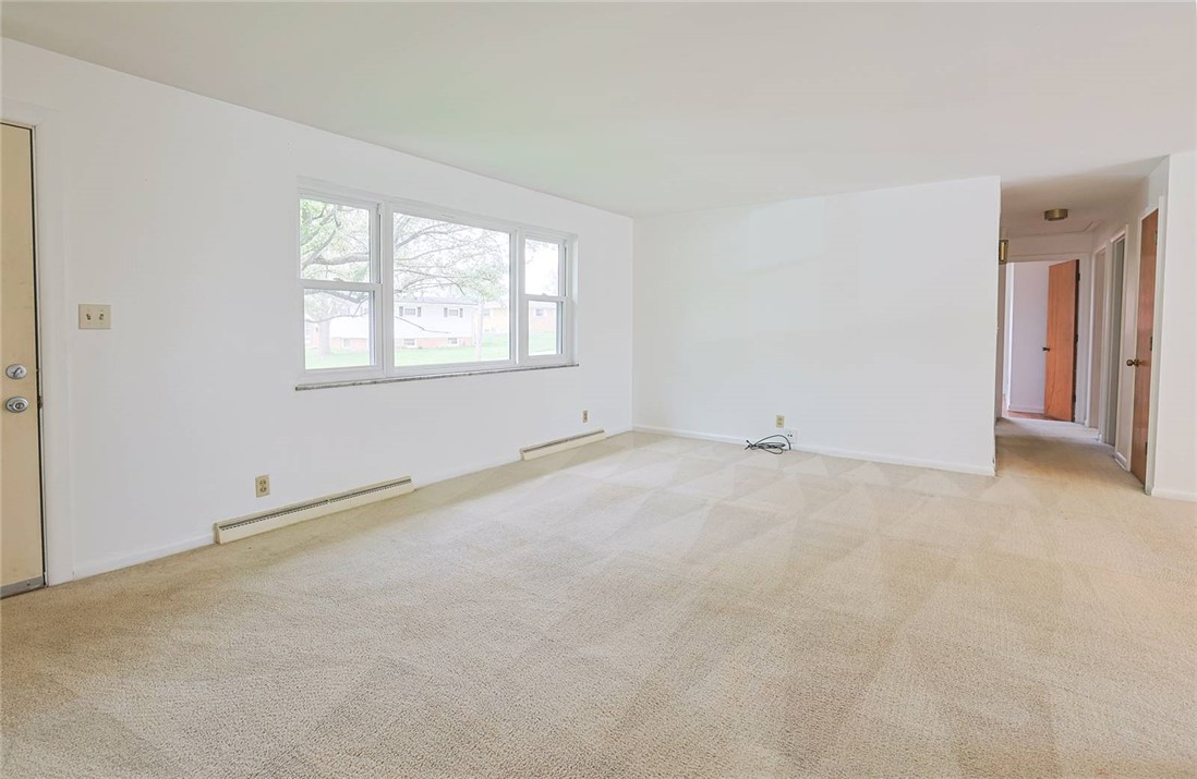 452 Cookston Avenue Springfield, OH 45503 - Photo 5 of 34 This bright living space features abundant natural light, offering a fresh canvas for personalization.