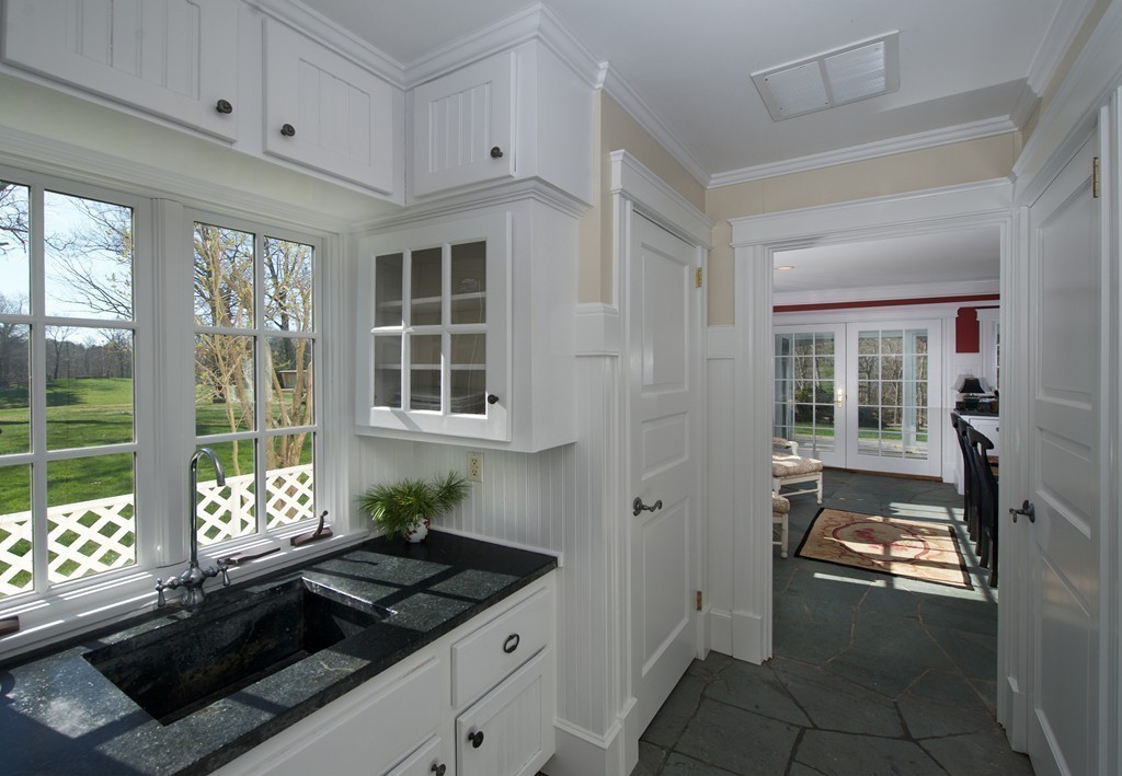 34 Black Brook Road Hamilton, MA 01982 - Photo 11 of 19 a kitchen that has a sink and a stove