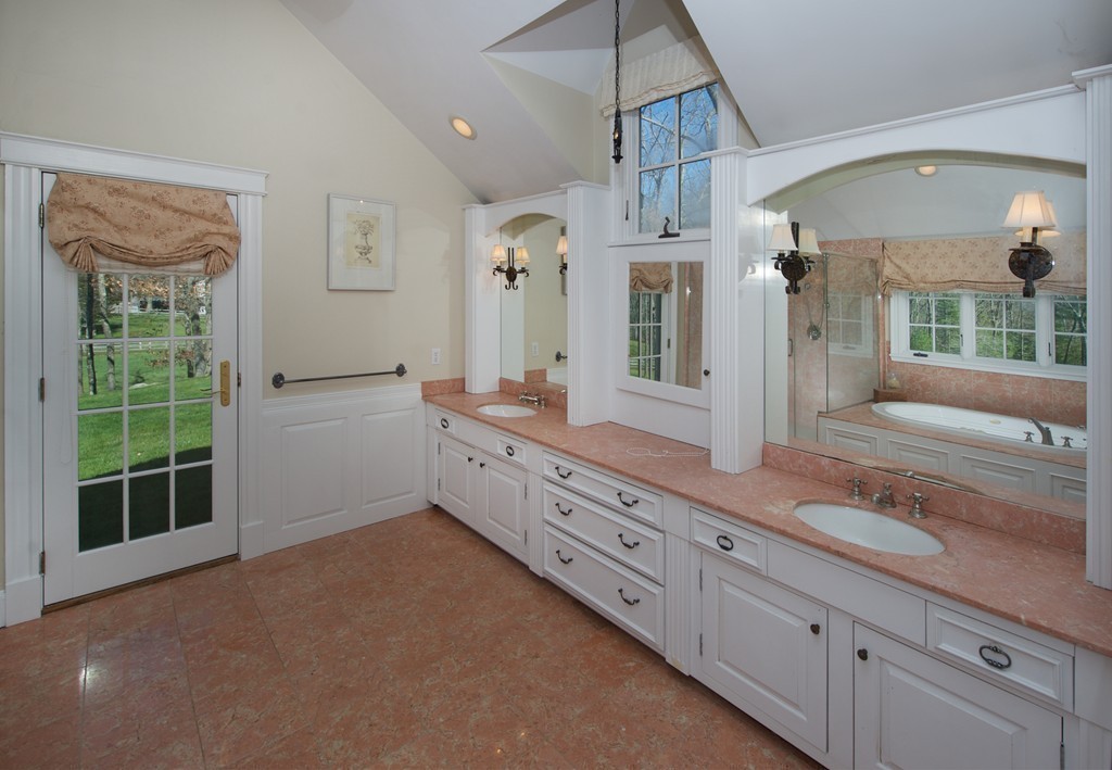 34 Black Brook Road Hamilton, MA 01982 - Photo 13 of 19 a spacious bathroom with a granite countertop sink mirror and window