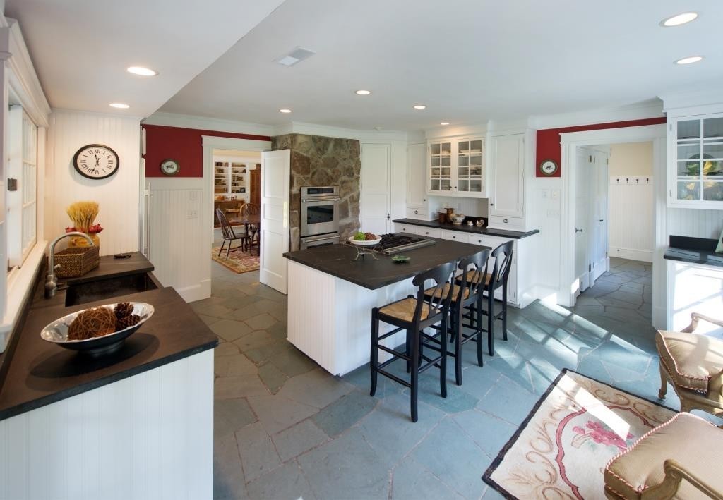 34 Black Brook Road Hamilton, MA 01982 - Photo 2 of 19 a kitchen with a table and chairs in it