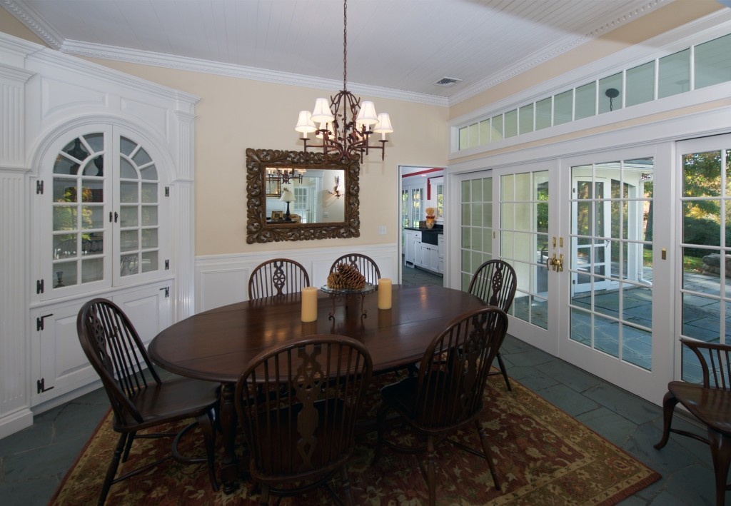 34 Black Brook Road Hamilton, MA 01982 - Photo 8 of 19 a view of a dining room with furniture window and outside view