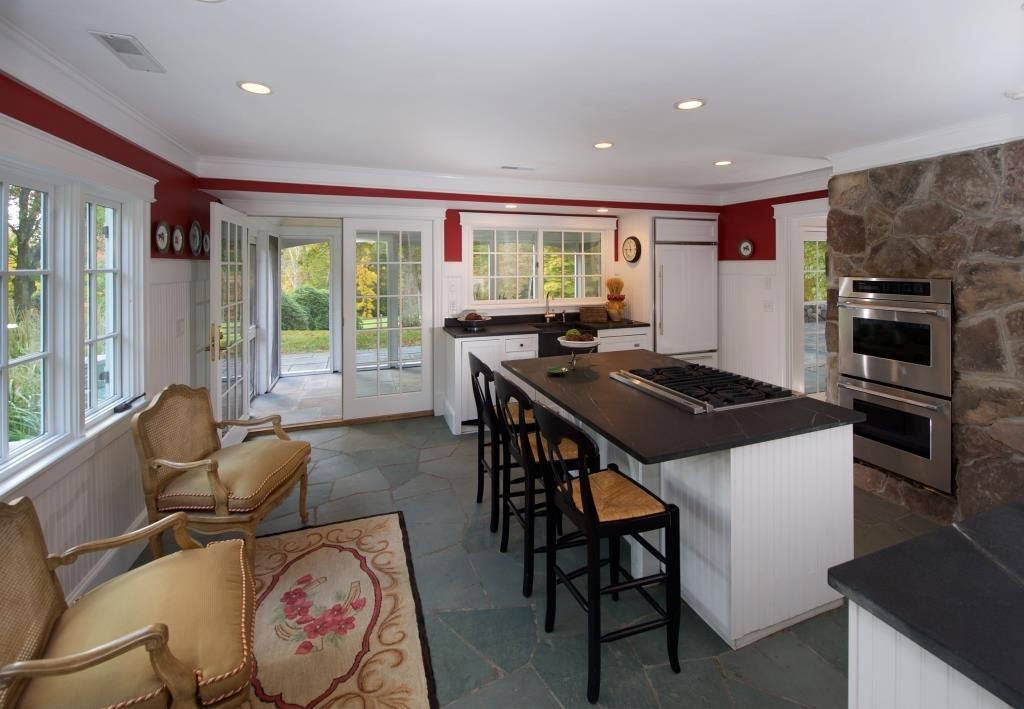 34 Black Brook Road Hamilton, MA 01982 - Photo 9 of 19 a view of a dining room with furniture window and outside view