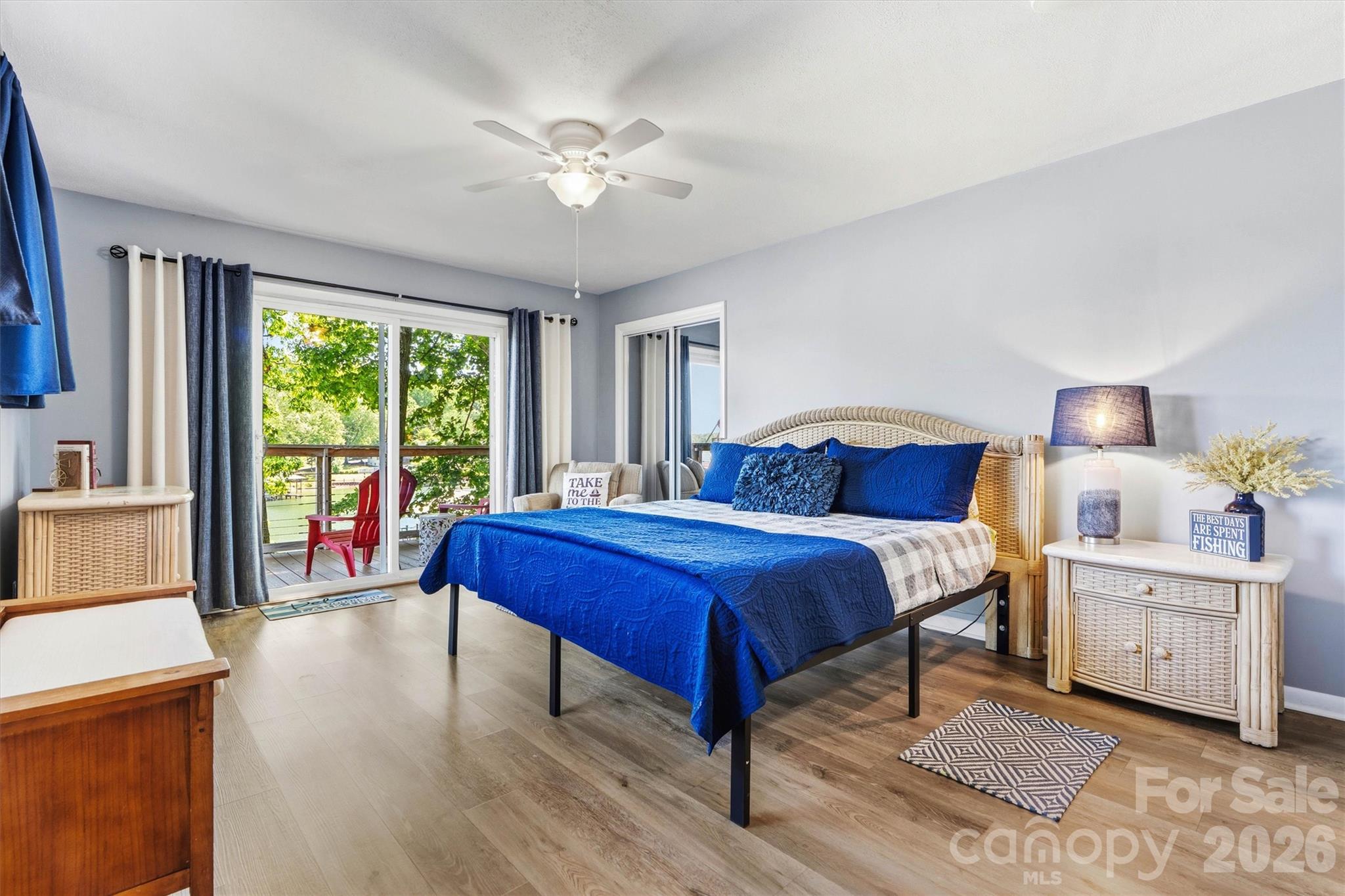 6566 Harbor Lane Conover, NC 28613 - Photo 16 of 43 a bedroom with a bed and a chandelier