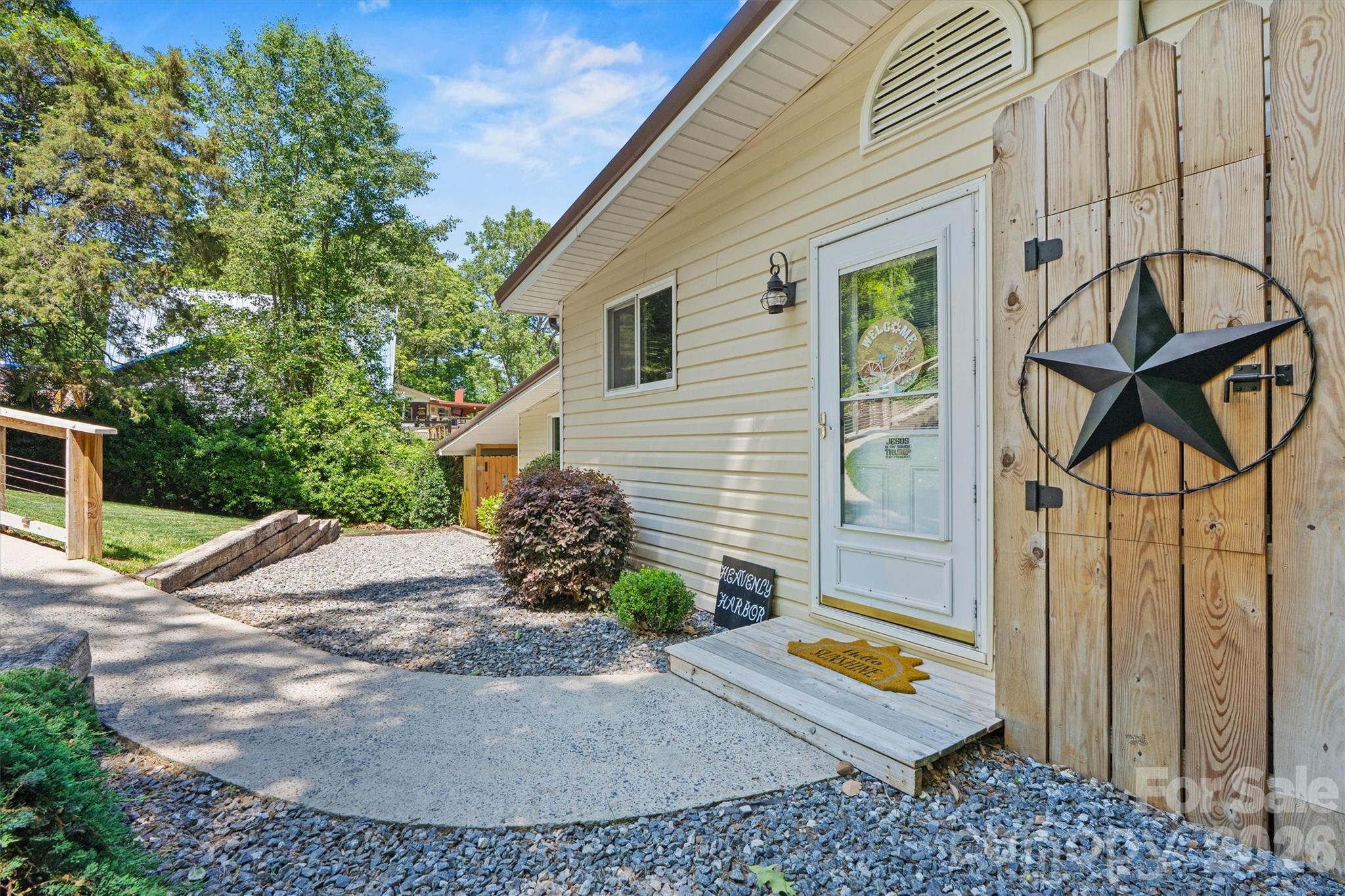 6566 Harbor Lane Conover, NC 28613 - Photo 2 of 43 a view of a backyard with plants