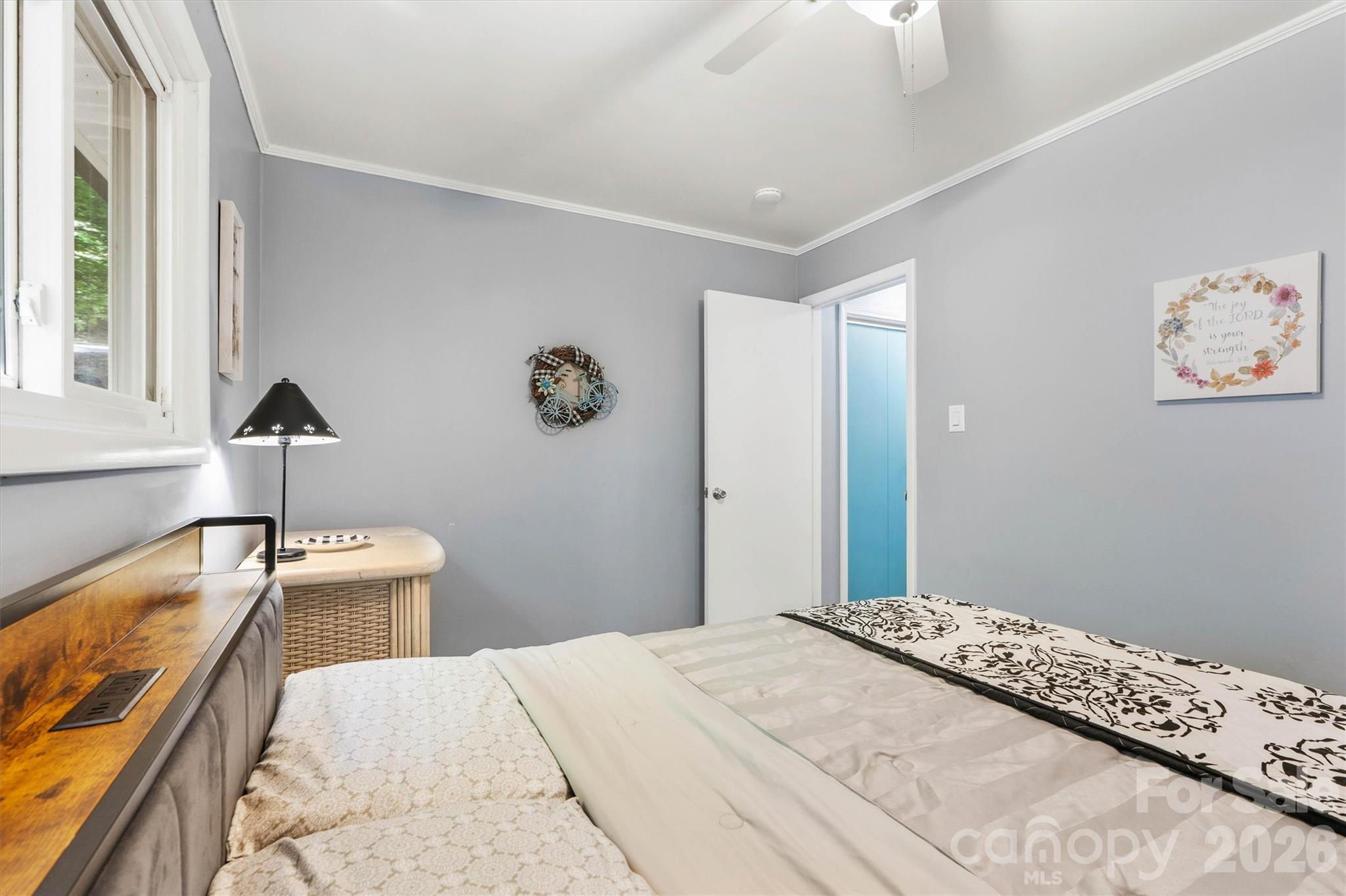 6566 Harbor Lane Conover, NC 28613 - Photo 23 of 43 a bedroom with a bed and a large window