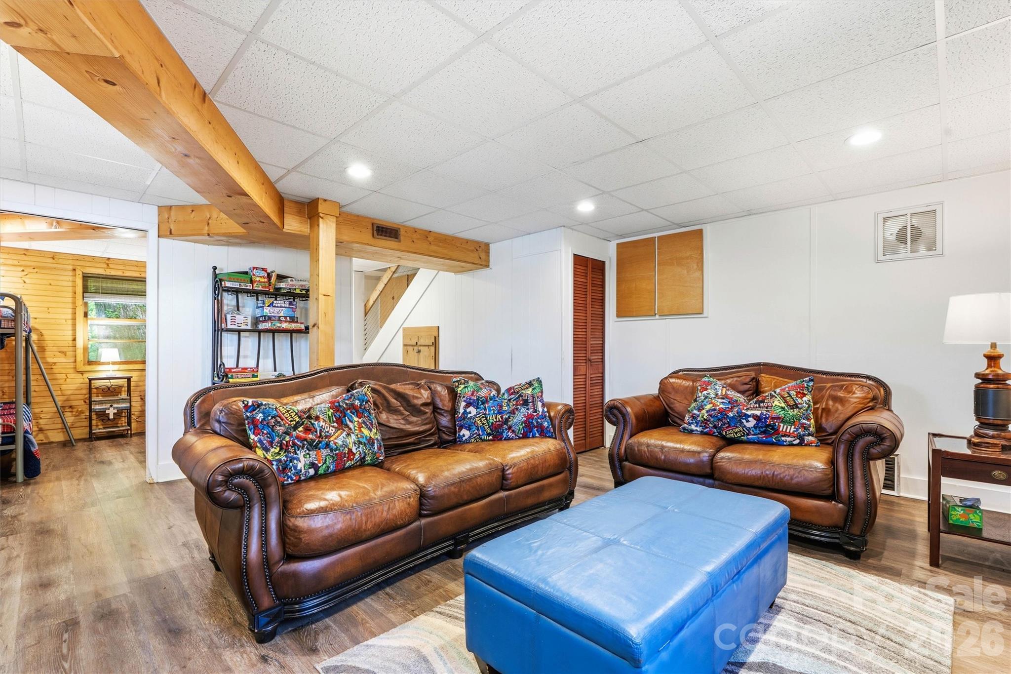 6566 Harbor Lane Conover, NC 28613 - Photo 28 of 43 a living room with furniture a couch and a piano next to a window