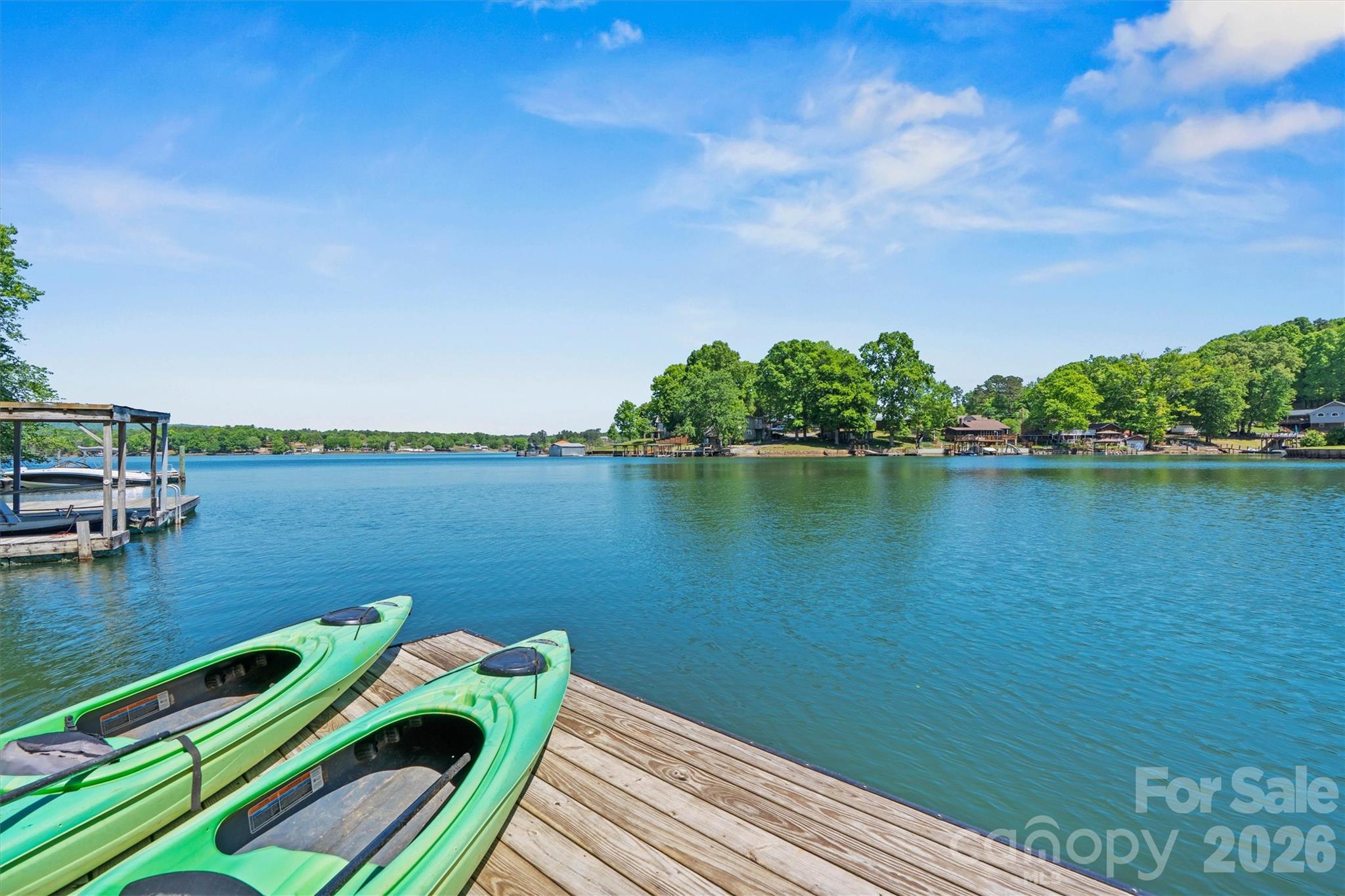 6566 Harbor Lane Conover, NC 28613 - Photo 38 of 43 a view of a lake with houses in the back